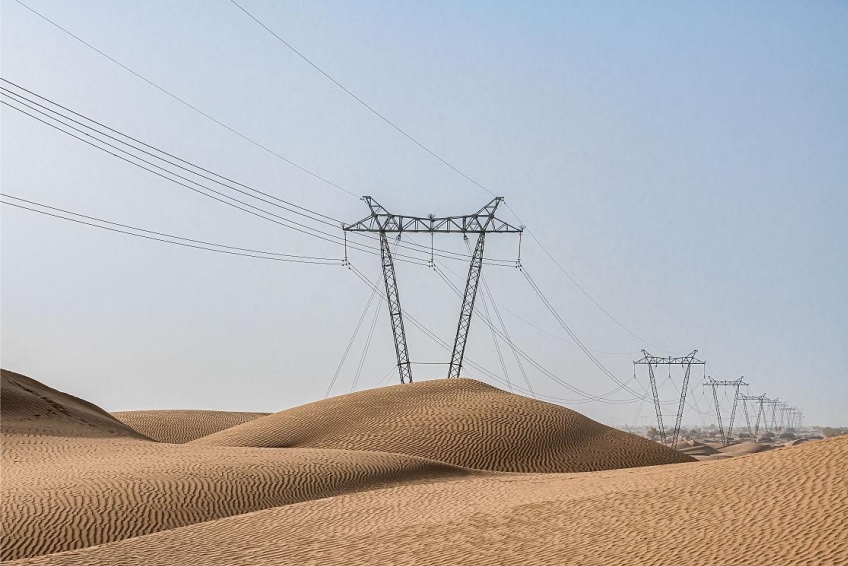 750km_Transmission_Line_Towers_Start_Operating_across_Desert_Taklimakan_Desert.jpg